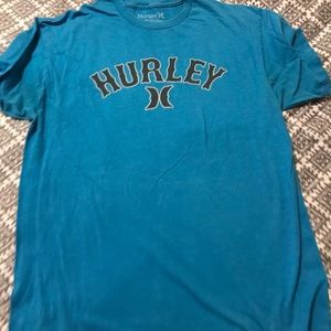 2 men’s Hurley ts